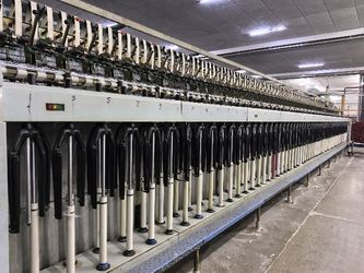 Wuxi Delicate Textile Technology Co ., Ltd . ligne de production en usine