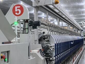 Wuxi Delicate Textile Technology Co ., Ltd . ligne de production en usine